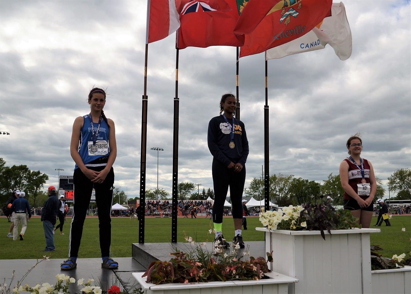 Anij on podium for her medal