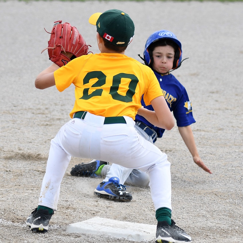 Wilson slides into third safe