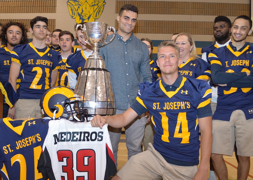 Medeiros with Grey Cup